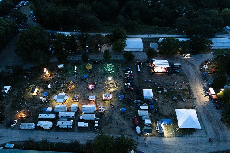 Aerial view of fairgrounds at night